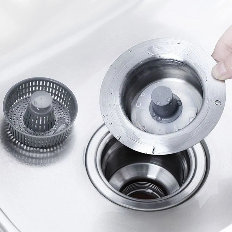 Close-up of kitchen sink drain strainer with micro-perforations & odor filtering mesh