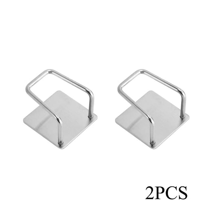 Compact kitchen sink storage solution: a self-adhesive stainless steel sponge holder