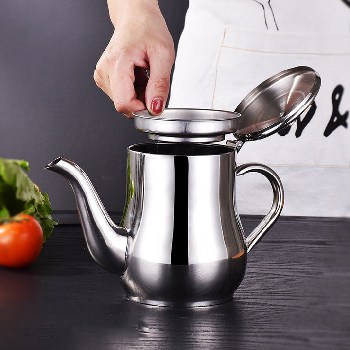 Durable stainless steel oil pot with a pouring spout, designed for easy and mess-free kitchen oil dispensing.
