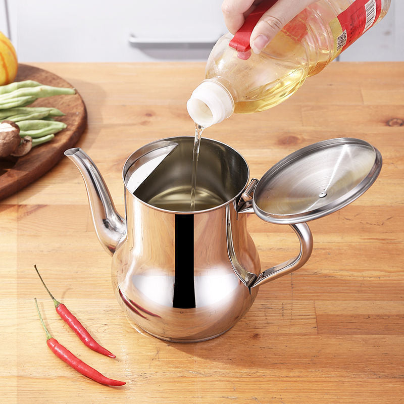 Oil dispenser with an integrated strainer, showcasing its effectiveness in separating grease and impurities.