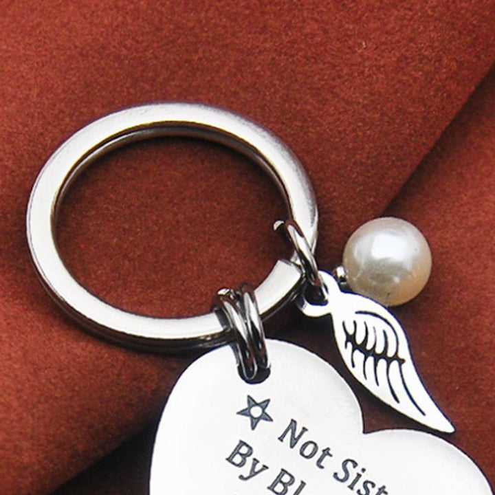 Stylish stainless steel accessory, sisterhood keychain, a meaningful and personalized gift.