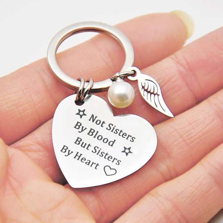Inspirational sisterhood keychain made from high-quality stainless steel, friendship gift idea.