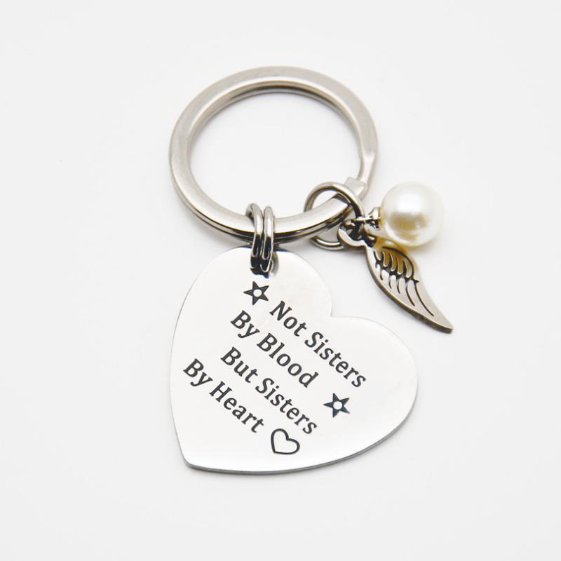 Sisterhood keychain, a thoughtful stainless steel gift for celebrating friendship bonds and unity.