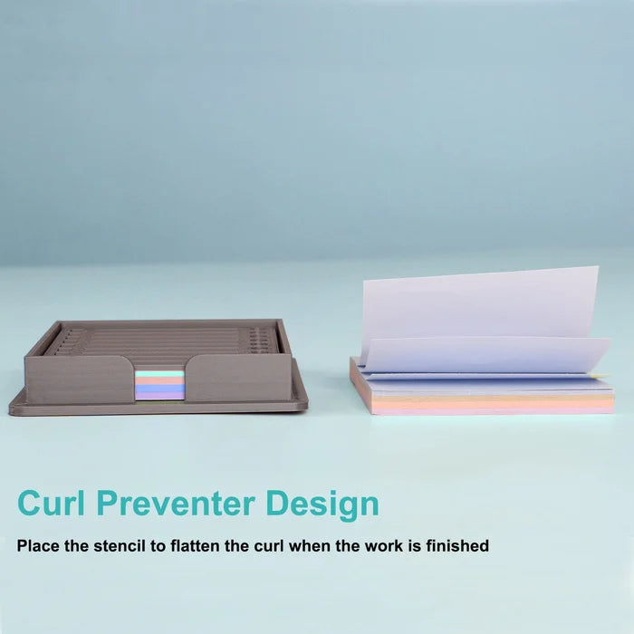 Compact sticky note dispenser with various stencil shapes, a handy office and school supply.