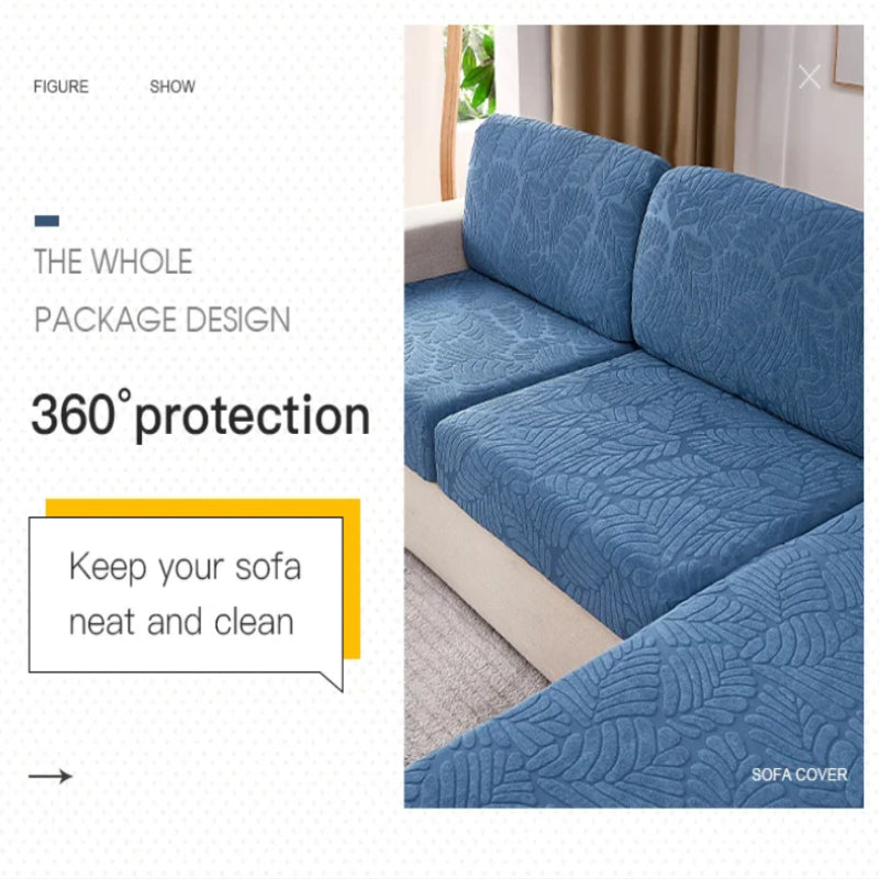 A modern living room featuring a couch with a stylish grey wear-resistant sofa cover, enhancing home decor.
