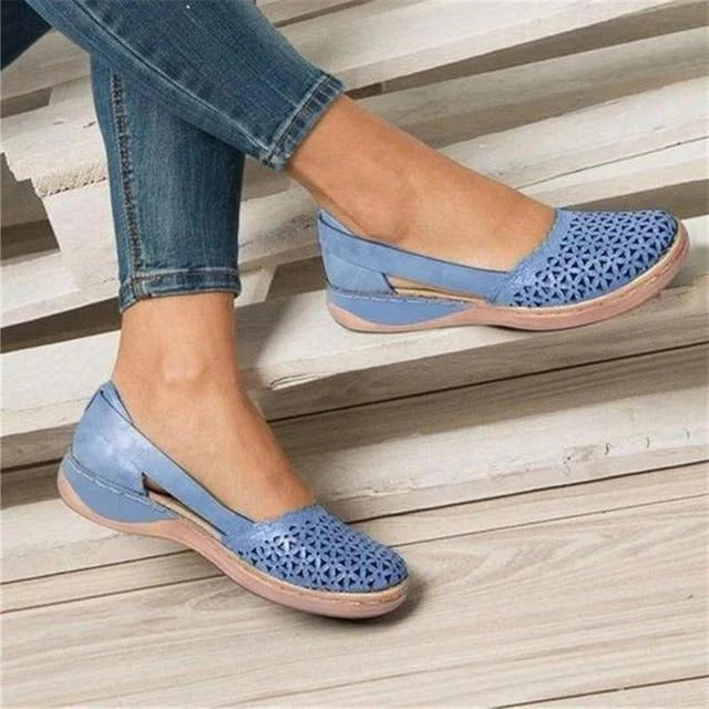 Stylish orthopedic black women's flats, designed for bunion relief and foot pain. Comfortable for everyday wear.