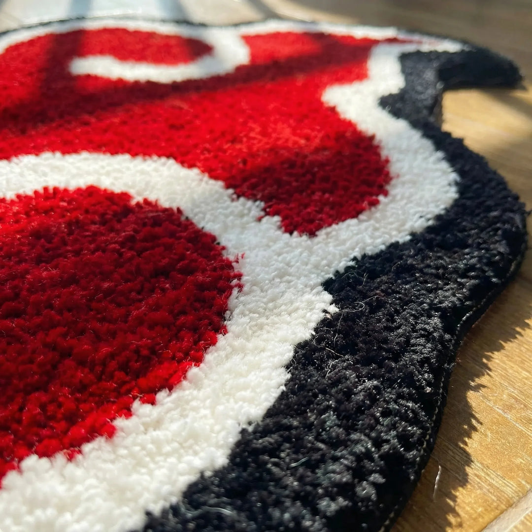 Decorative cloud-shaped statement area rug for modern homes. Stylish indoor floor mat with unique wave design.