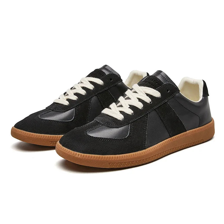Modern men's casual footwear: durable lace-up low-top sneakers offering daily comfort and style.