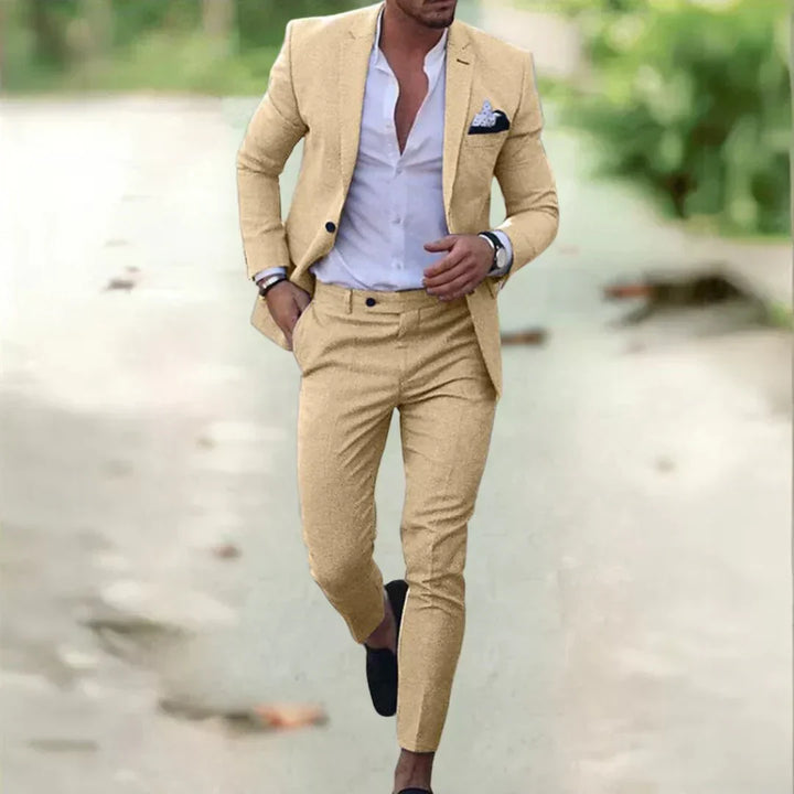 Men's versatile slim fit suit styled with a crisp shirt & tie, perfect formal wear for any professional occasion.