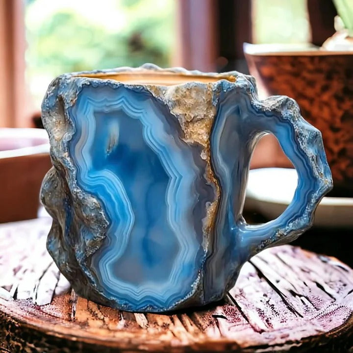 Modern stylish mineral crystal tea cup, a unique piece of drinkware for home or office.