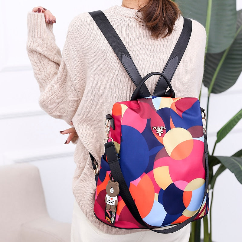 Stylish women's anti-theft water-resistant backpack for daily use & travel. Secure compartments & durable design.