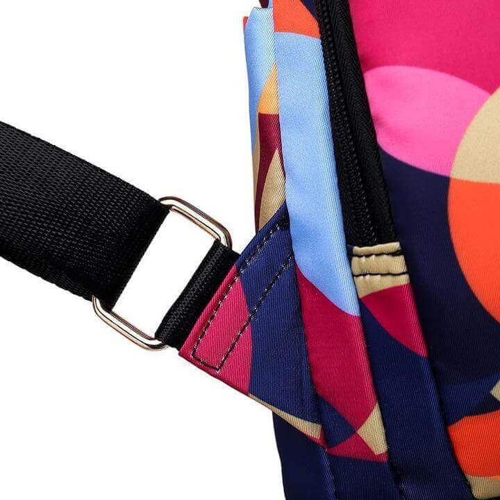 Interior of women's anti-theft travel backpack with laptop sleeve & multiple compartments. Organized & secure.