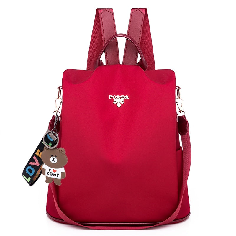 Durable water-resistant women's backpack, featuring anti-theft design for secure and dry carrying.