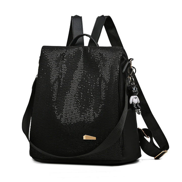Modern women's anti-theft water-resistant backpack. Stylish, lightweight, and organized for travel or daily use.