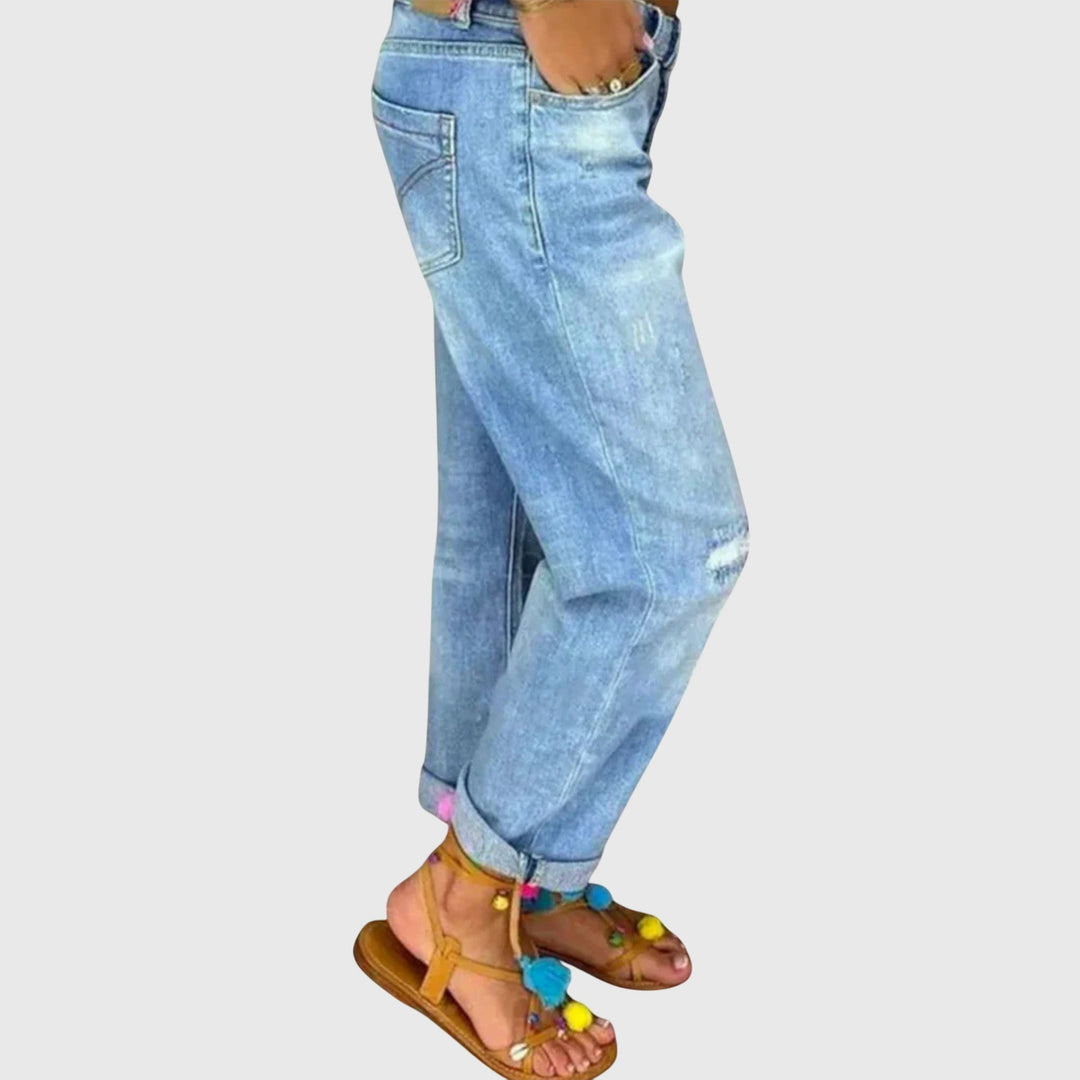 Effortlessly stylish women's baggy blue jeans. Loose fit pants perfect for casual spring fashion & comfort.