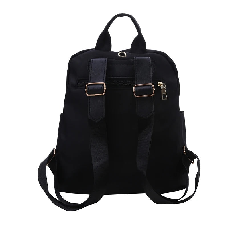 Women's fashion PU leather backpack. Sleek black design, great for daily essentials & weekend travel.