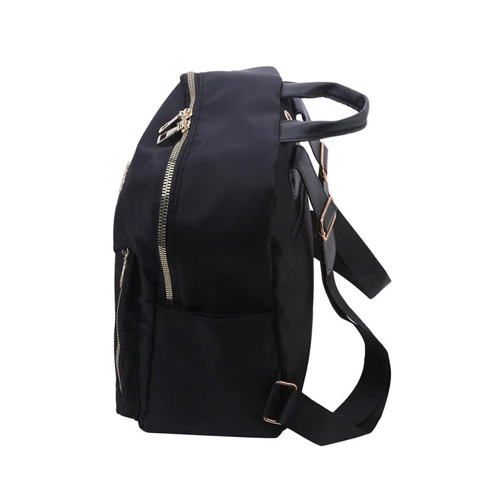 Women's black PU leather backpack, convertible for travel or daily use. Stylish & practical shoulder bag.