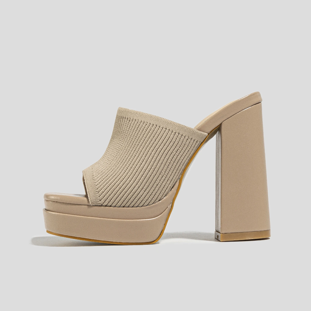 Elegant women's platform sandals with a supportive design, adjustable straps for secure & comfortable everyday style.
