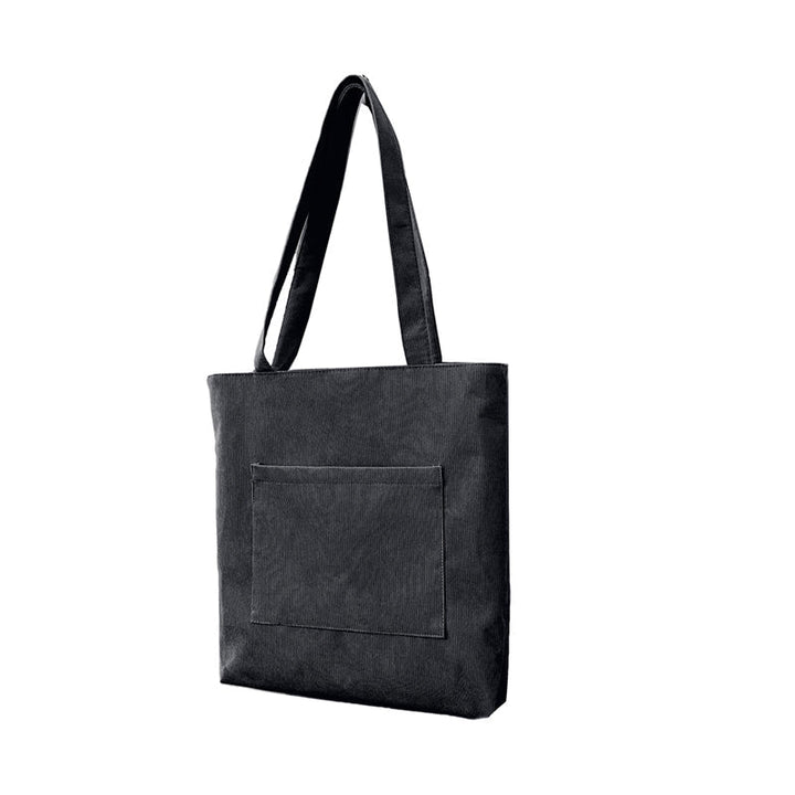 Women's corduroy tote bag with adjustable straps, offering versatility and comfort for any occasion.