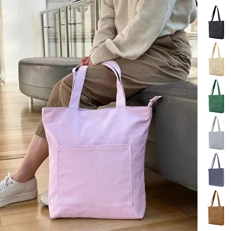 Beige corduroy tote bag for women, featuring multiple external pockets and a comfortable shoulder strap.