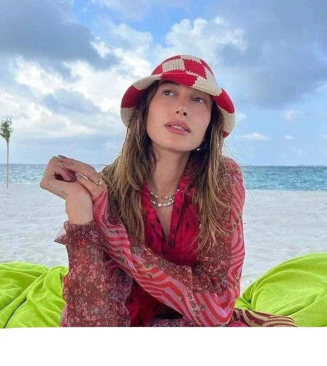 Handmade crocheted plaid bucket hat for women, ideal stylish sun protection during summer vacations.