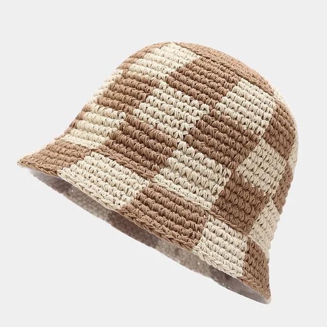 Versatile women's crocheted plaid bucket hat. A chic beach hat offering sun protection for any outfit.