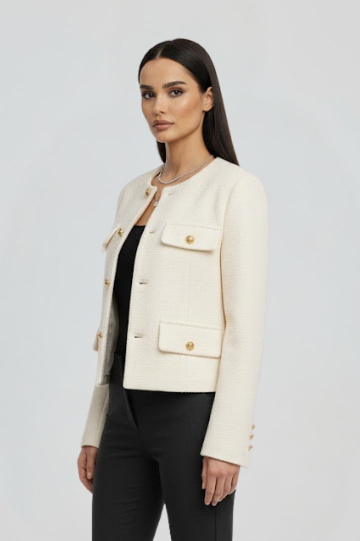 Sophisticated women's cropped jacket with a button front. Casual chic and elegant for any occasion.