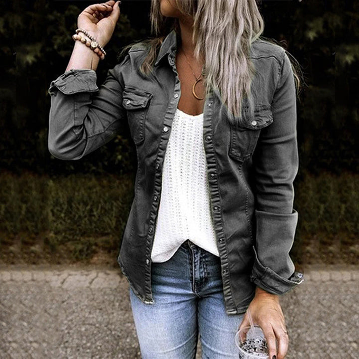 Elegant women's denim jacket with a classic button-front, high-quality denim for casual outerwear.