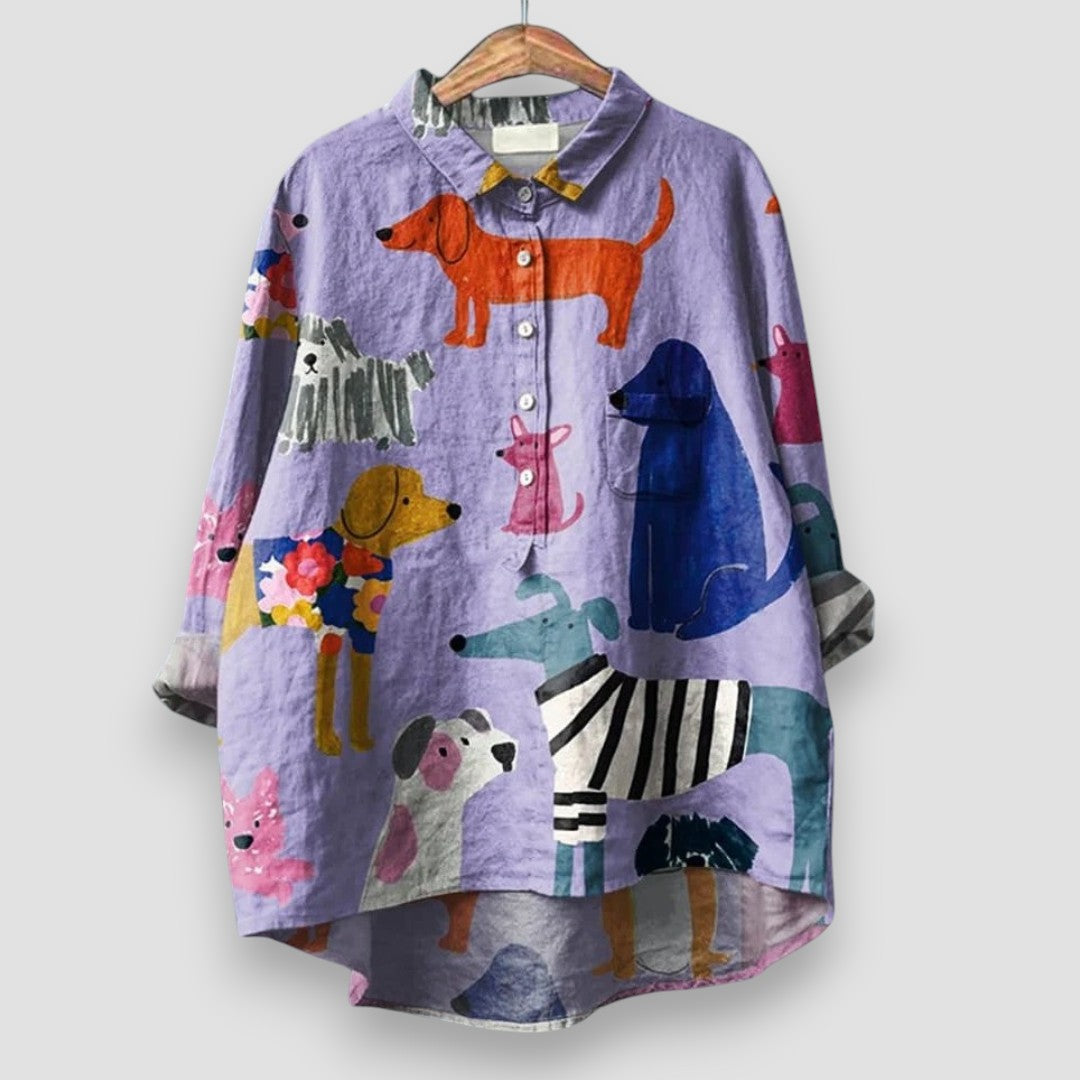 Stylish women's dog print button-up blouse. Long sleeve, collared, relaxed fit for casual elegance. Perfect for animal lovers.