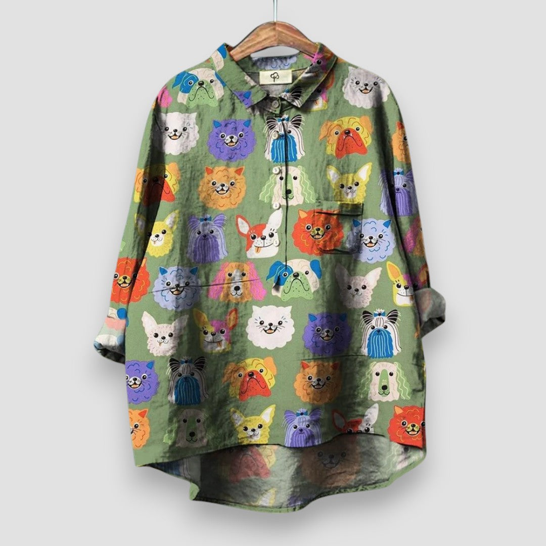 Casual women's button-up blouse with charming dog print. Long sleeve & collared. An elegant, relaxed fit top for animal lovers.