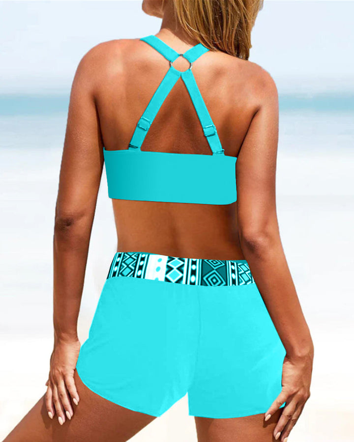 Fashionable women's high-waisted geometric bikini. Adjustable two-piece set for chic poolside or beachwear.