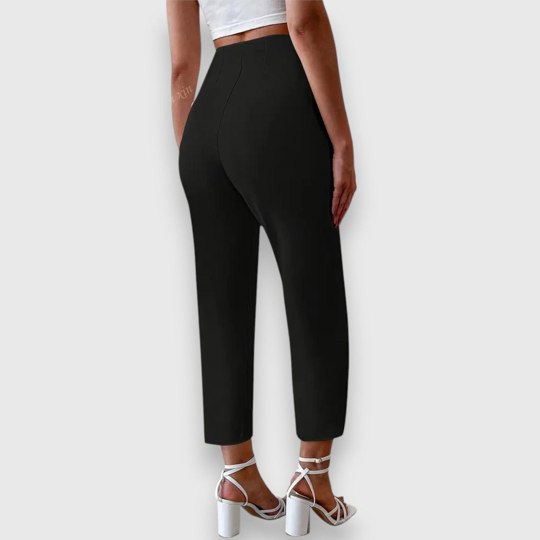 Women's professional straight leg dress pants with a high waist, offering a sleek, modern, & flattering silhouette.