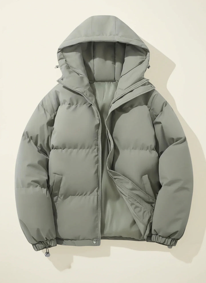 Versatile women's hooded puffer coat, an essential warm and stylish ladies jacket for winter outerwear.