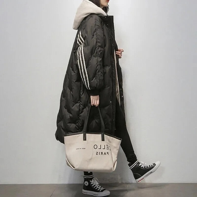 Durable women's long padded jacket, providing ultimate winter comfort and warmth for everyday wear.