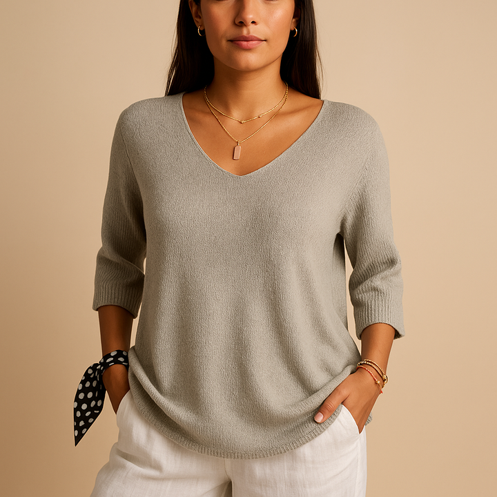 Elegant women's comfort top with a loose fit and modern design. Ideal for versatile casual and dressy outfits.