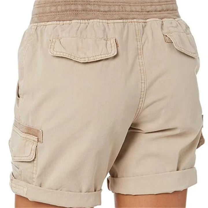 Casual low-rise beach shorts for women, perfect for summer days & beachwear.