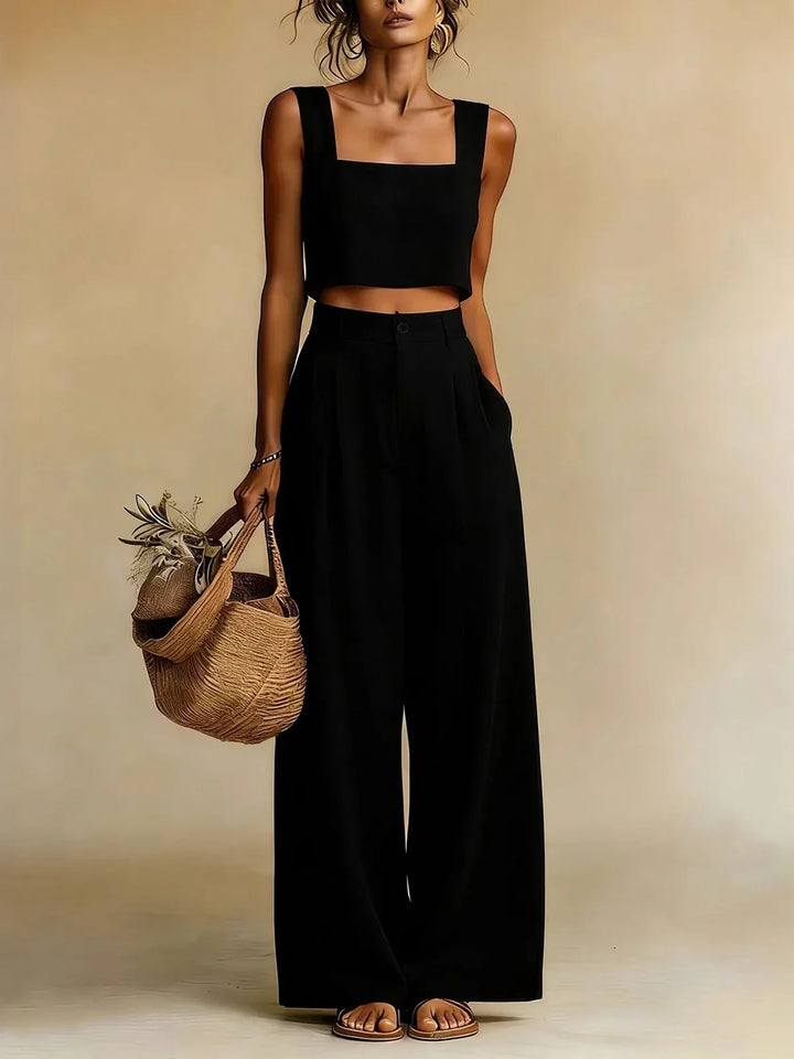Comfortable women's two-piece palazzo set: relaxed flowing top & wide-leg pants. Ideal for casual elegance.