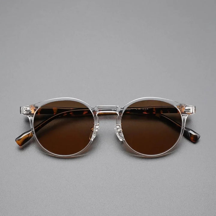 Chic women's leopard print round sunglasses with UV400 protection, scratch-resistant fashion accessory.