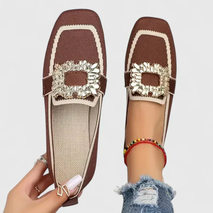 Versatile women's flat mules with a square toe and rhinestone buckle, suitable for both casual and dressy occasions.