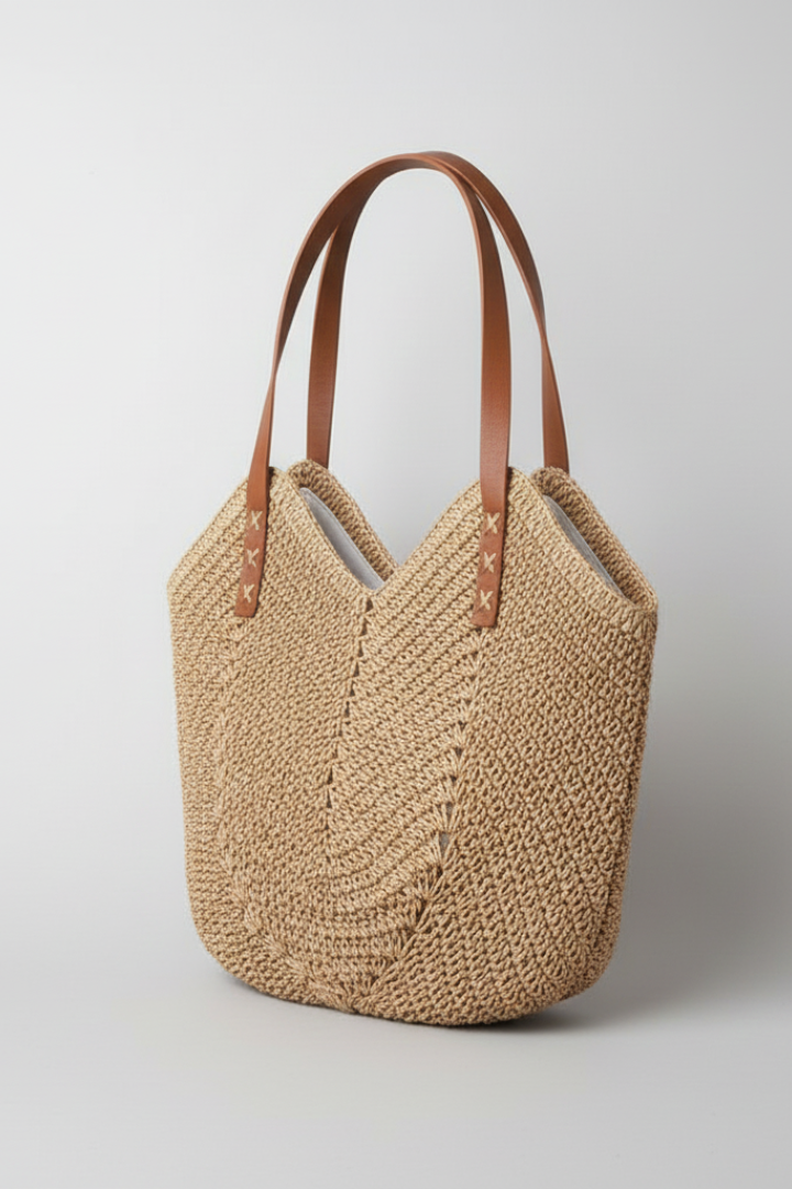Chic beige textured shoulder bag for women, featuring long handles; a versatile fashion handbag.