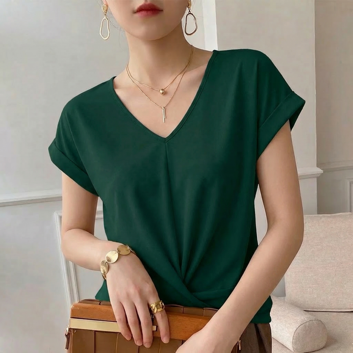 Stylish women's twist front V-neck top with short sleeves. Perfect for comfortable casual everyday wear or summer.