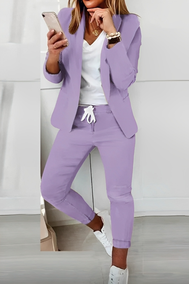 Empowering women's two-piece pantsuit, designed for a stylish, confident look in any office or event setting.