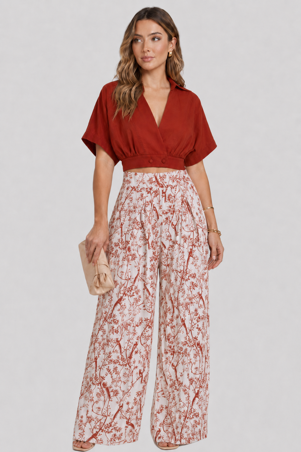 Woman modeling a chic V-neck top & wide-leg trousers set. Stylish, comfortable, and perfect for summer or resort wear.