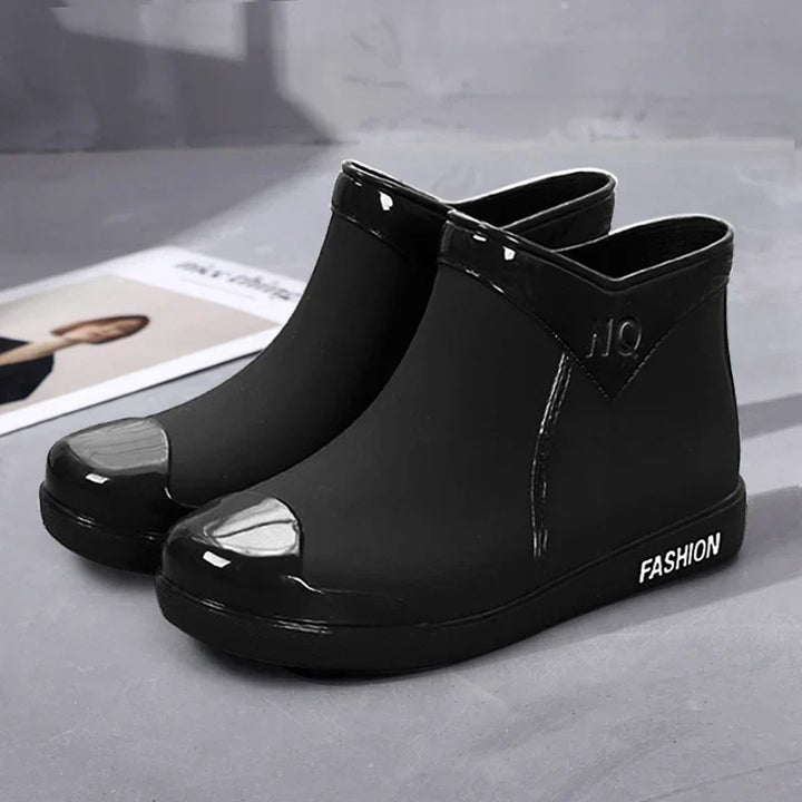 Stylish women's waterproof ankle boots with side zip. Perfect for autumn fashion and staying dry in the rain.