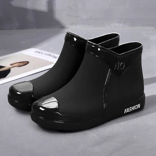 Comfortable ladies' waterproof rain boots, sleek design with side zipper & non-slip sole for all-day wear.