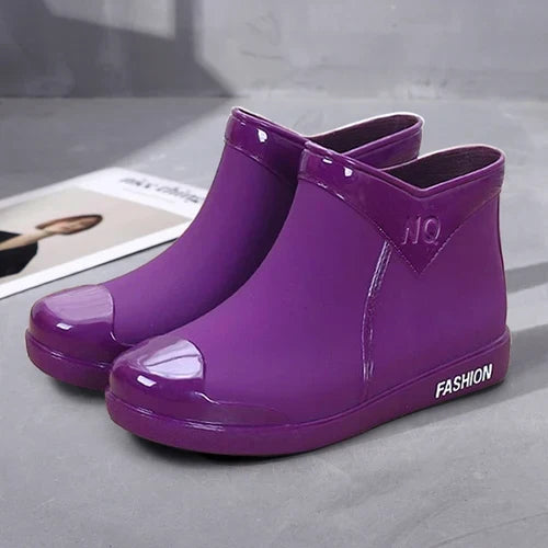 Fashionable women's ankle boots, waterproof with a convenient side zip. Ideal for autumn weather & style.