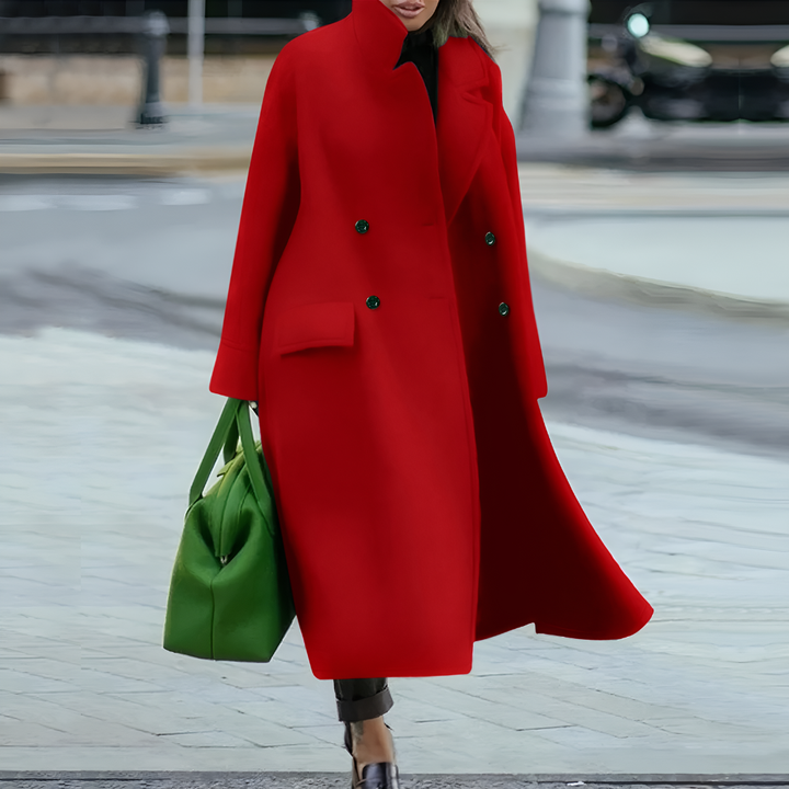 Stylish women's waterproof long rain coat with button closure, perfect for all weather.