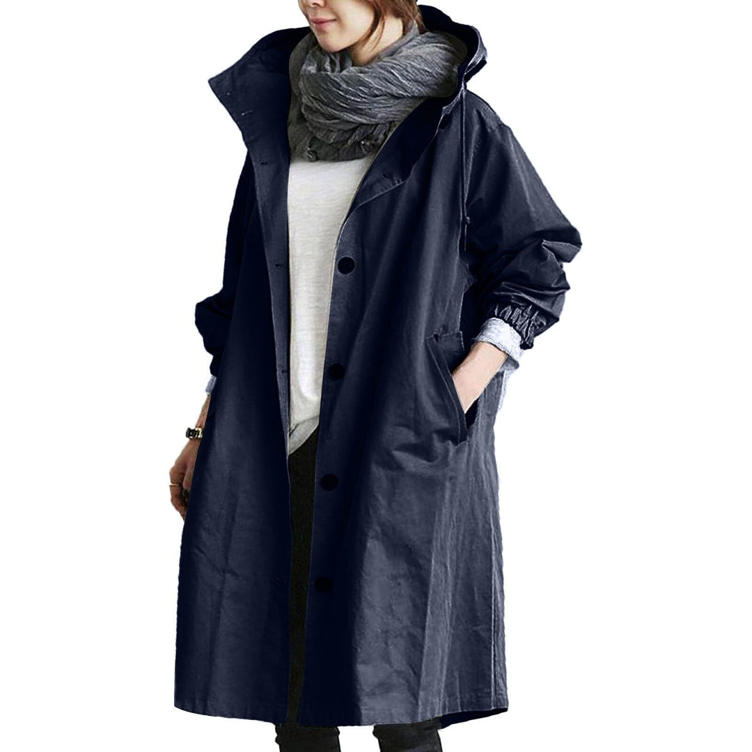 Chic women's waterproof long rain jacket, a stylish trench coat for ultimate outdoor protection.
