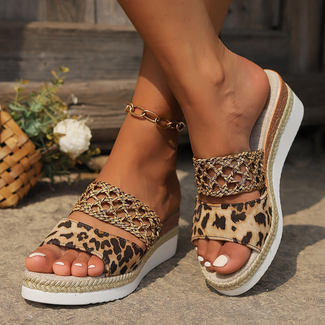 Stylish women's woven wedge sandals for a chic, effortless summer look.