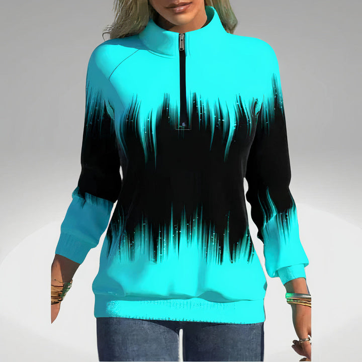 Comfortable Elvira women's zip collar sweatshirt. Stylish long sleeve pullover, great for everyday casual fashion.